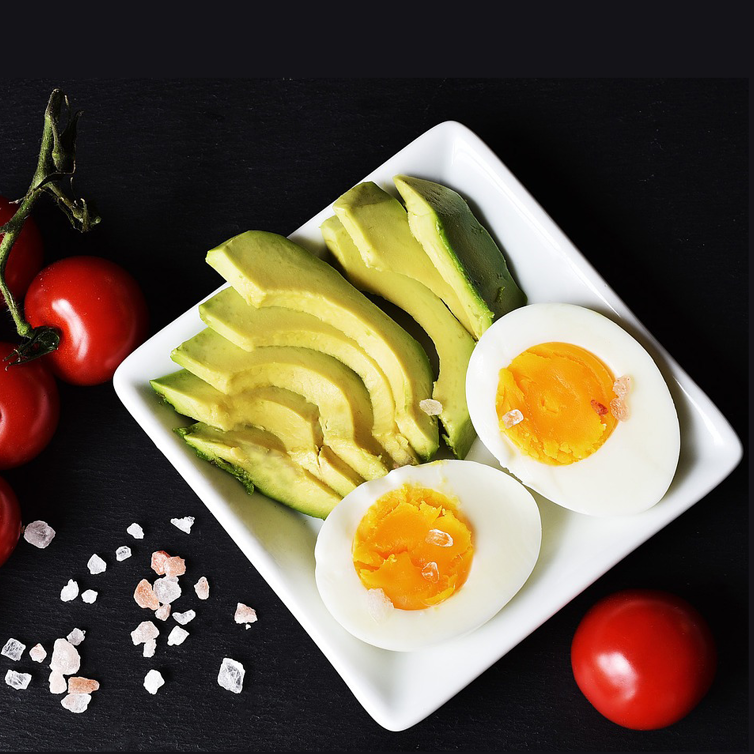 hard boiled egg and avocado on a plate