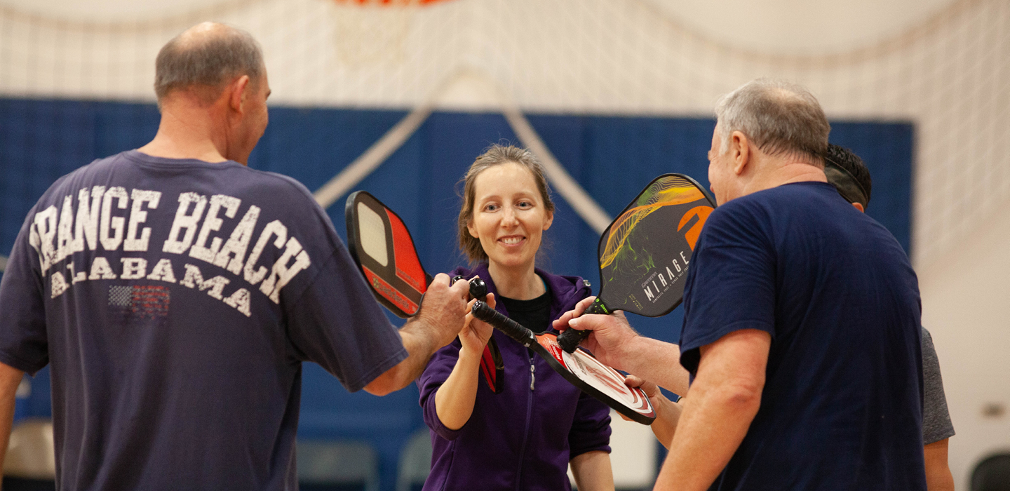 Try a game of pickup Pickleball to get a great workout and meet new friends