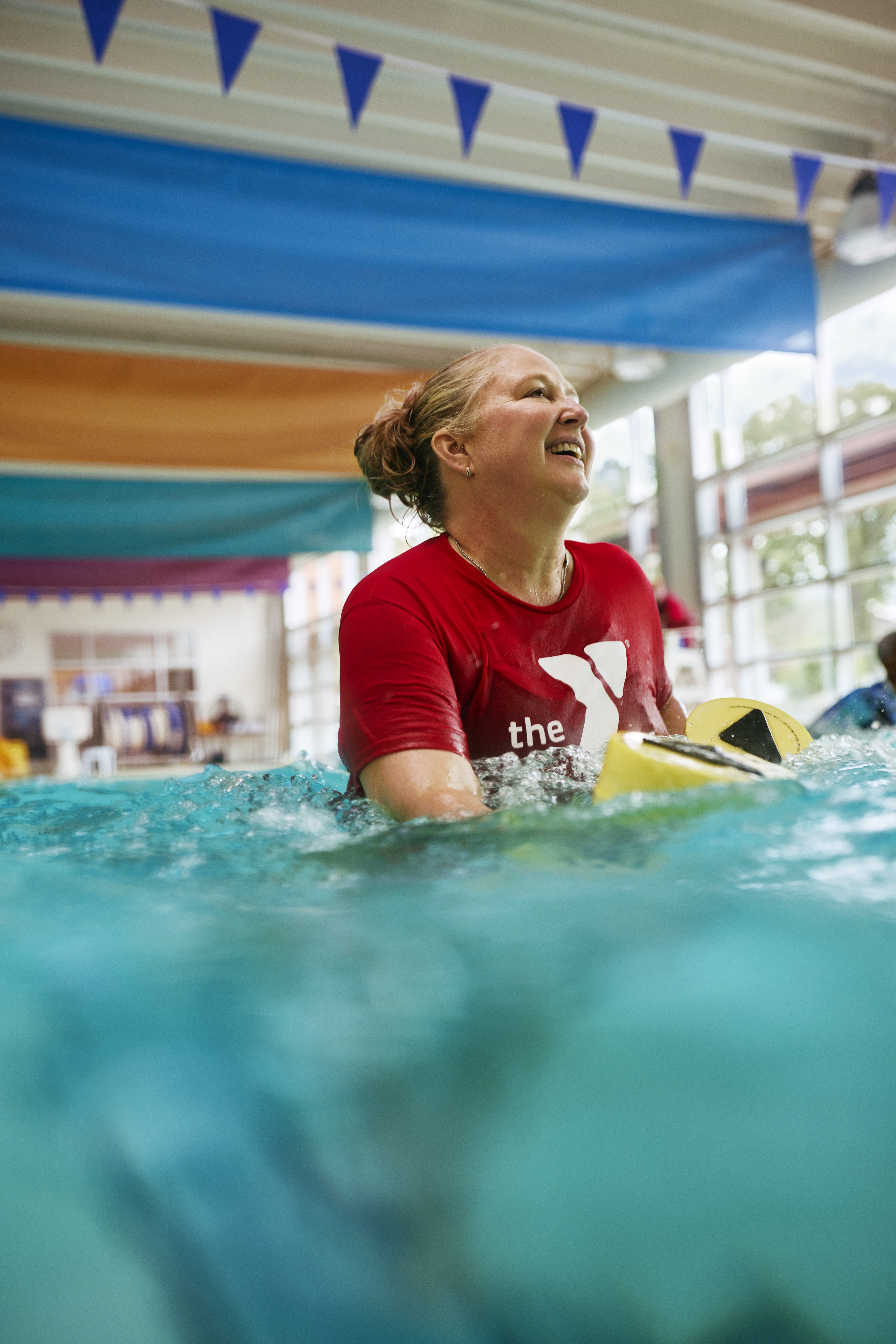 Woman using water exercise equipment