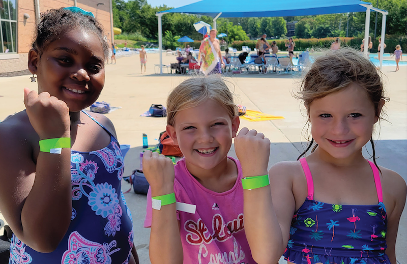 YMCA Go for Green Program Participants Safety Around Water Initiative with Green Swim Bands