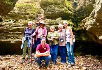 women posing for photo outdoors at women's wellness weekend in ymca trout lodge