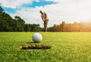 man golfing