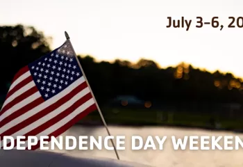 flag on a lake with text that says July 3-6, 2025 Independence Day Weekend