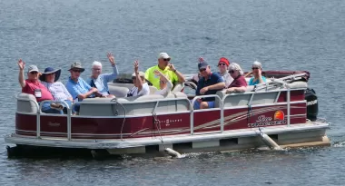 YMCA Trout Lodge guests on a pontoon boat