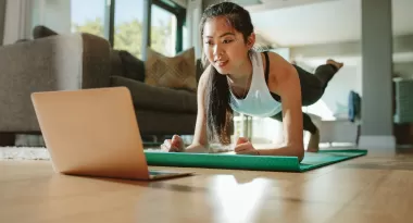 girl virtual workout through computer
