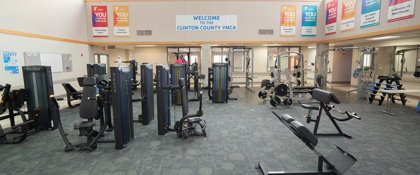 Weight machines throughout room. Wide paths between equipment.