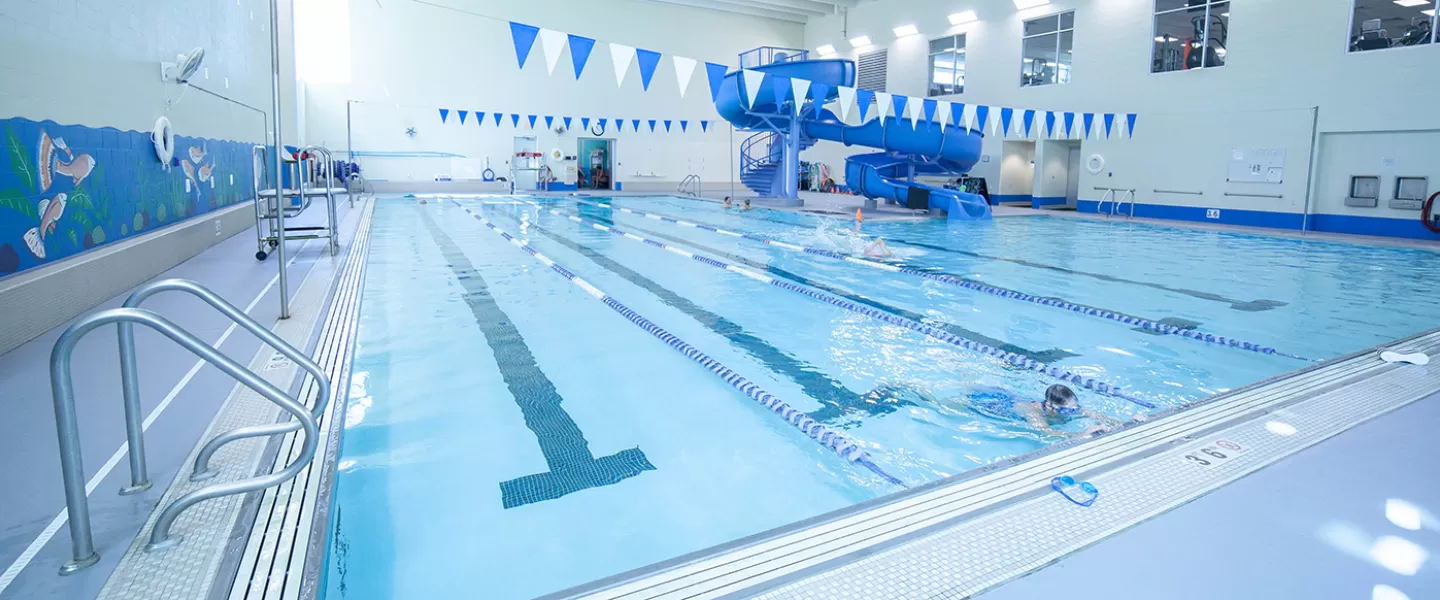 5-lane indoor pool with shallow area on side. Large two-story slide.