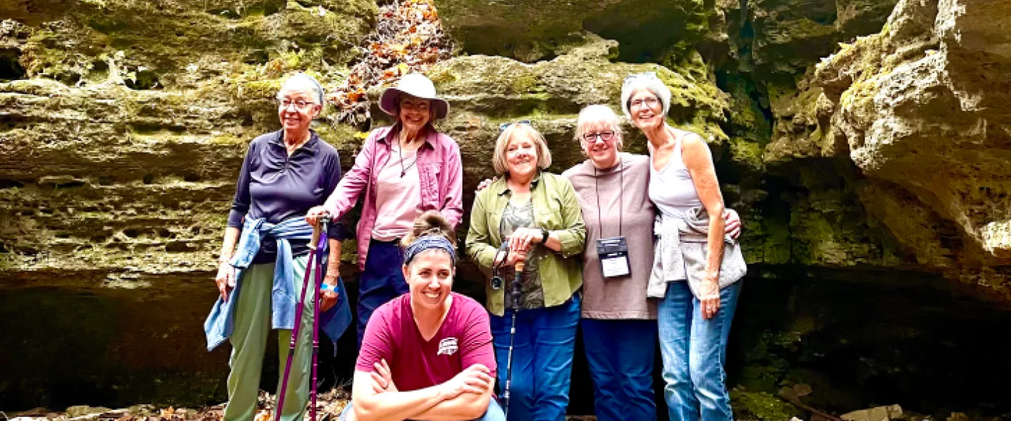 women posing for photo outdoors at women's wellness weekend in ymca trout lodge