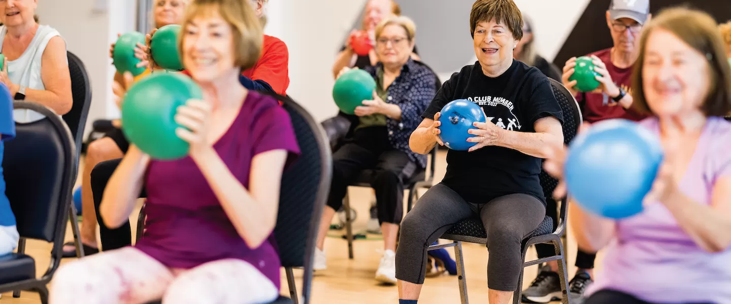 older adults in silver sneakers class at the ymca