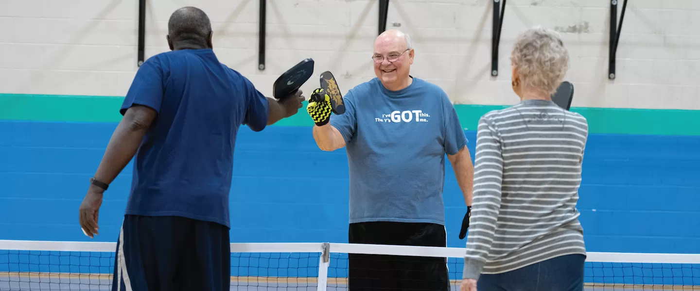 older adults playing pickleball at the ymca
