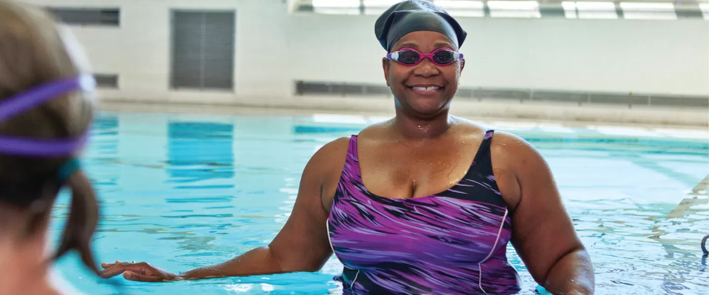 Woman Lap Swimming in a YMCA Indoor Swimming Pool