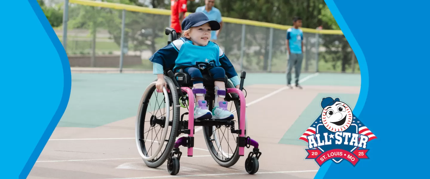 young girl in wheelchair playing adaptive baseball at the ymca with all star game logo