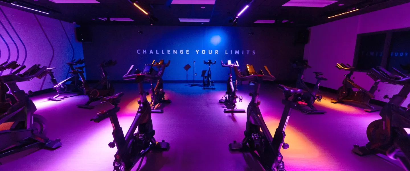 Chesterfield Family YMCA Brand New Cycling and Spinning Studio with updated graphics, lighting, and state-of-the-art stationary workout bikes.