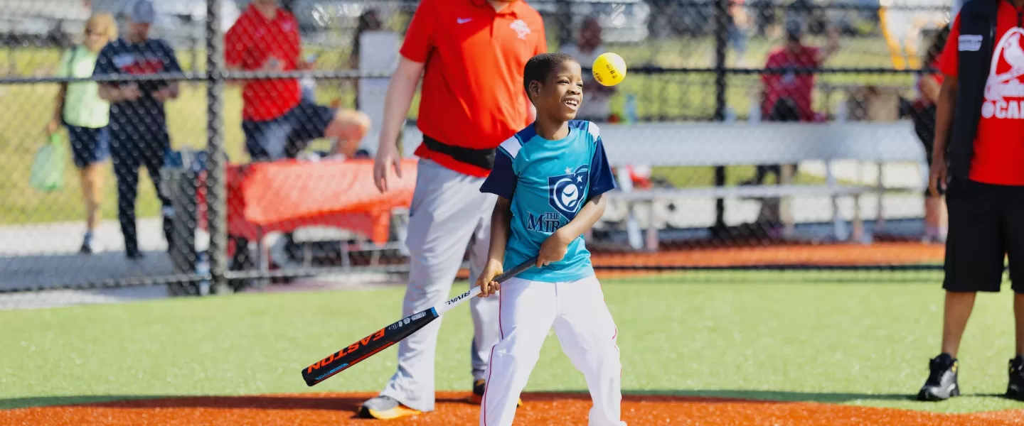 YMCA Adaptive Sports Complex Boy Hitting Baseball