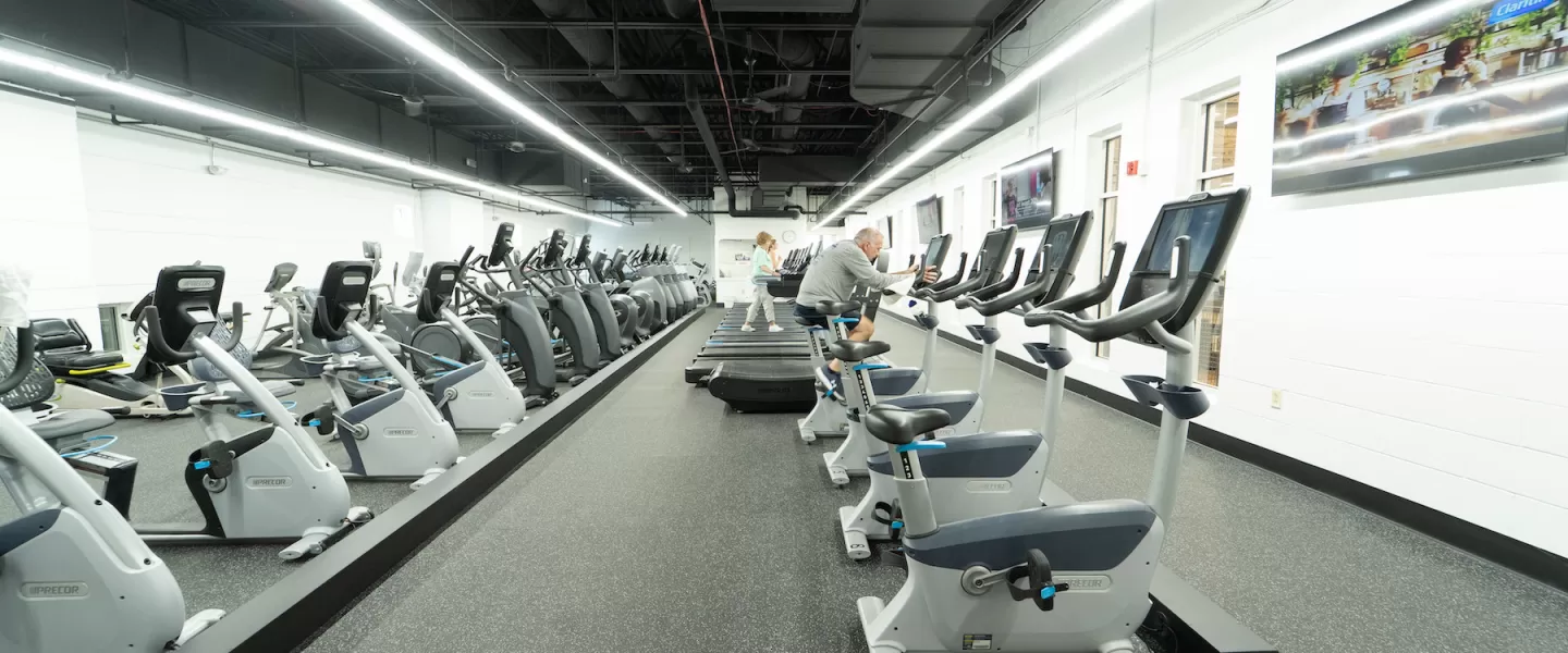 Modernized fitness center at Four Rivers YMCA with brand-new cardio equipment and updated workout space