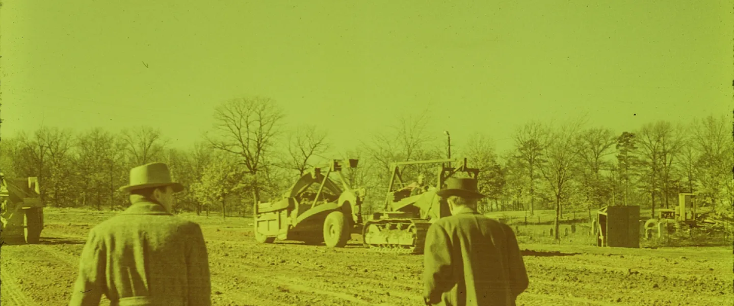 Vintage 1940s earth-moving equipment clearing land for the Sunnen Lake dam project at YMCA Trout Lodge.