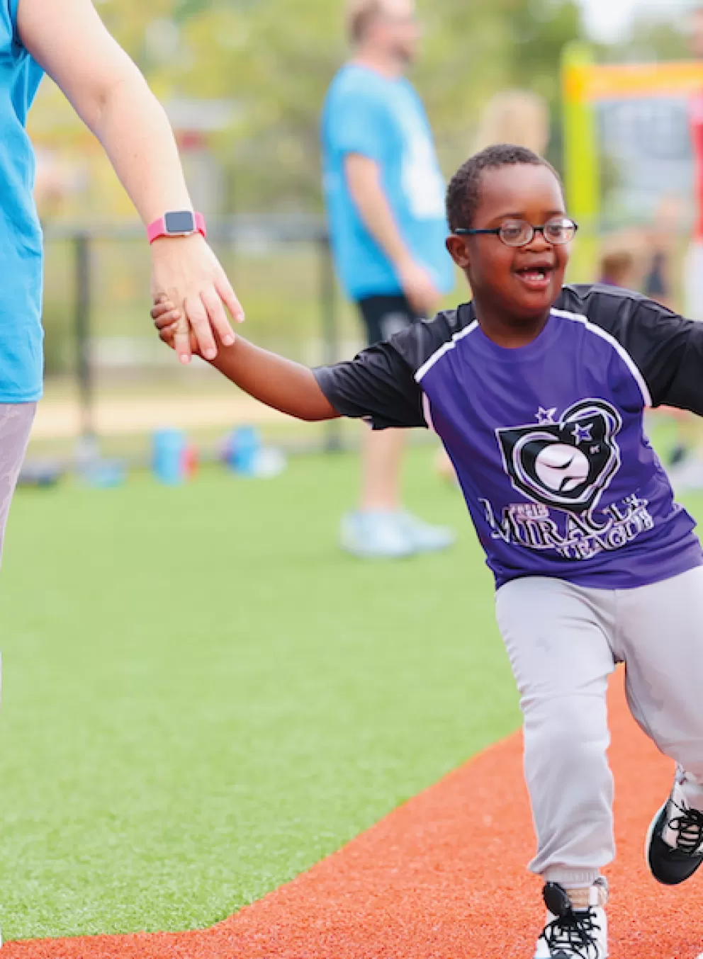 ymca adaptive baseball participant