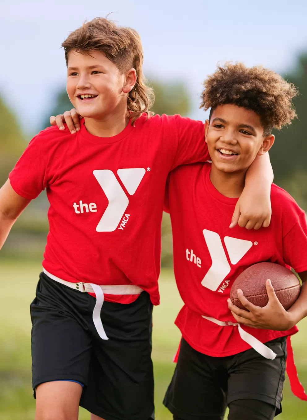 YMCA Youth Flag Football League Friends and Players Smiling at Practice