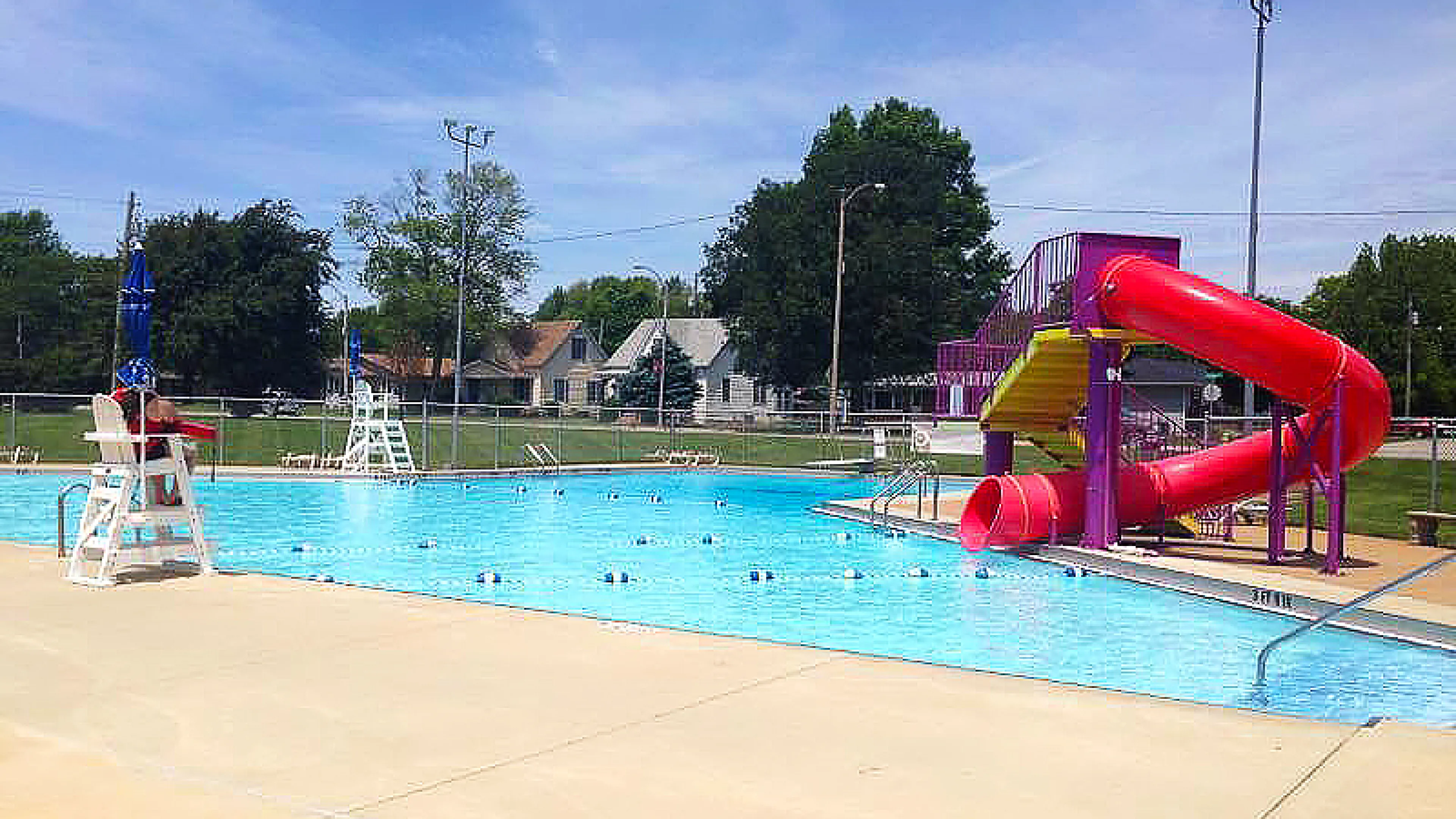 New Baden Legion Memorial Outdoor Pool in New Baden, IL Water Slide and Swimming Areas with YMCA Lifeguards