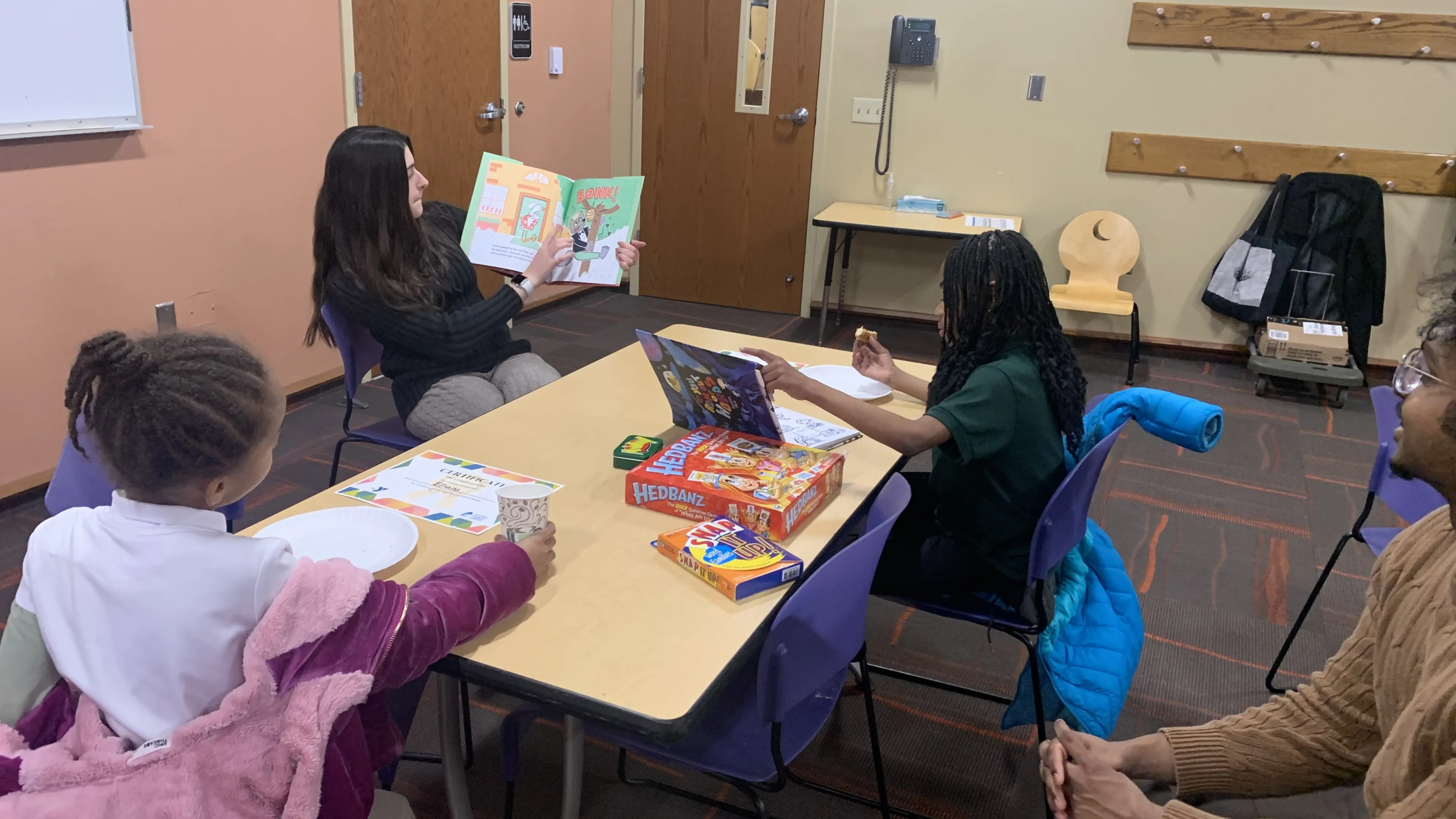 washu campus y student tutoring kids
