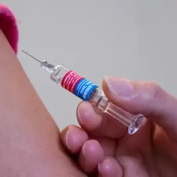 a person getting a flu shot