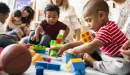 Thumbnail: infants play with building blocks in a ymca early learning readiness program