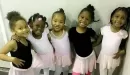 Thumbnail: Five young, African American dancers pose for a photo in their varying black and pink leotards and skirts. They are excited to take their dance classes at the YMCA together. 