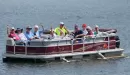 Thumbnail: YMCA Trout Lodge guests on a pontoon boat