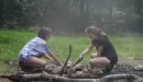 Thumbnail: Campers building a fire at Camp Lakewood