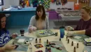 Thumbnail: Three women painting at table