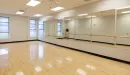 Thumbnail: Group exercise studio for barre classes. Mirrors throughout. 