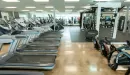 Thumbnail: Cardio area with rows of treadmills, ellipticals, rowers, and stair step machines.
