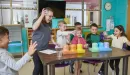 Thumbnail: ymca y club staff doing a STEAM experiment with y club participants