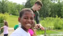 Thumbnail: Staff fishing with young boy