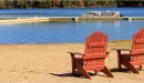 Thumbnail: ymca trout lodge beachfront and two chairs
