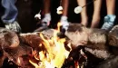 Thumbnail: toasting marshmallows for s'mores