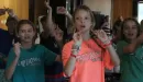 Thumbnail: girls in Lakewood tshirts following along to some moves