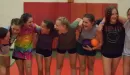 Thumbnail: girls laughing and posing in the gym