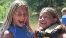 Thumbnail: girls laughing near the lake in lifejackets