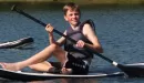 Thumbnail: boy on a paddle board on the lake