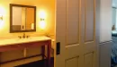 Thumbnail: trout lodge guest rooms vanity and guest beds