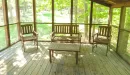 Thumbnail: trout lodge screened in porch in forest view cabins