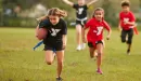 Thumbnail: ymca youth flag football participant runs out in front of the defense