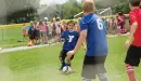 Thumbnail: ymca youth soccer participant scrimmaging with the defense 