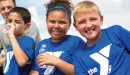 Thumbnail: ymca youth soccer participants smiling and rehydrating during a game