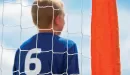 Thumbnail: ymca youth soccer goalie protecting the soccer net
