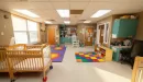 Thumbnail: Tri-City YMCA Early Childhood Education Center Infant Area with Cribs