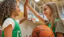 Thumbnail: ymca youth basketball girls high fiving