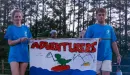 Thumbnail: Adventurers group walking with their banner