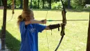 Thumbnail: ymca camp lakewood archery bow and arrow drawn at target